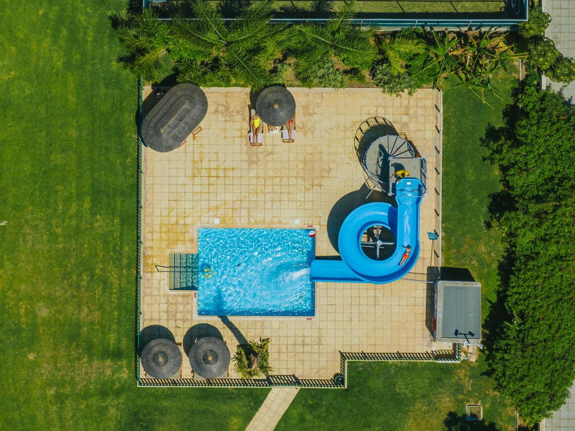 Golden Bay Beach Hotel Larnaca Exteriör bild Aerial view of the water park